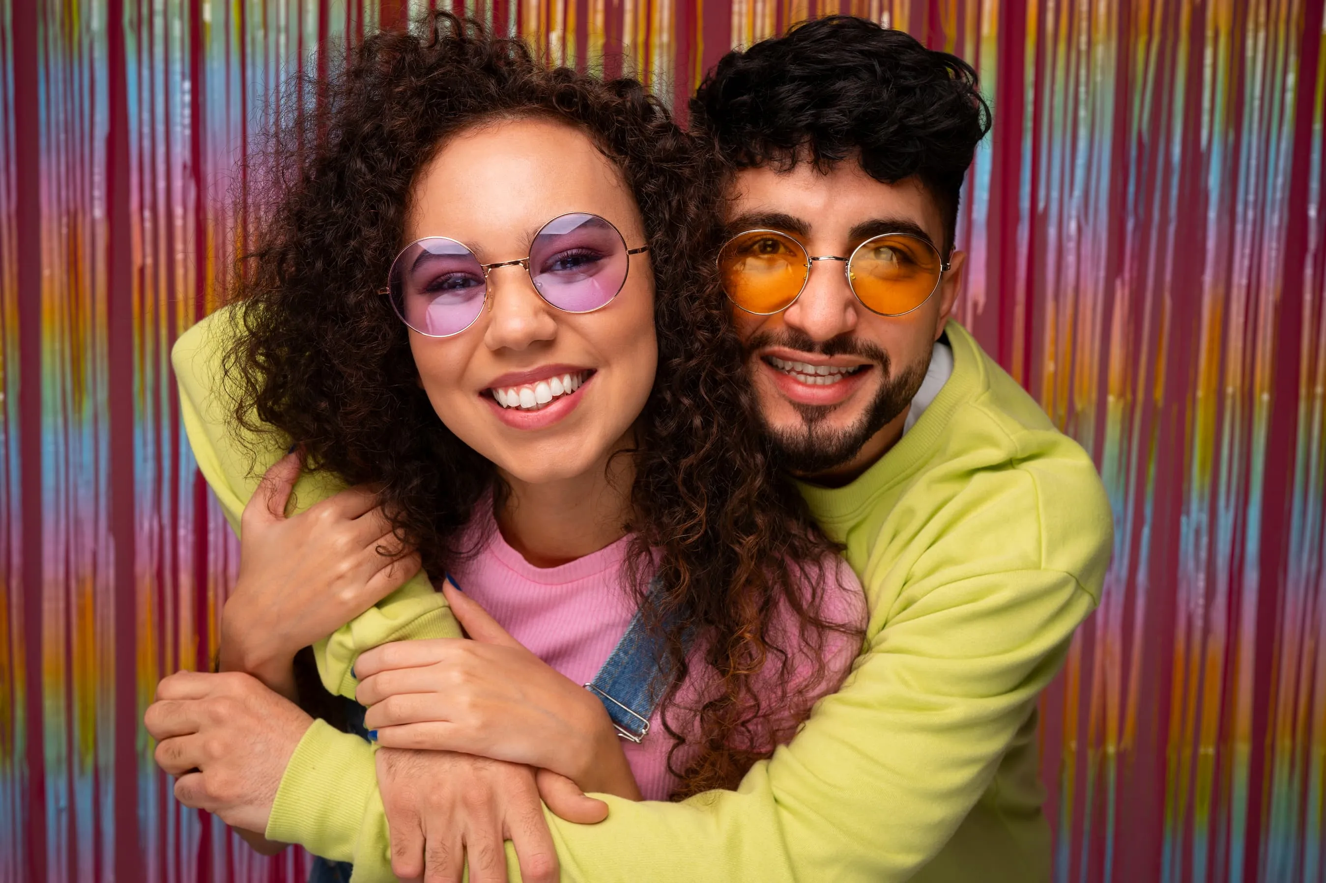 Couple with colorful sunglasses